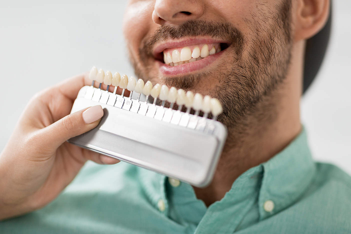 man during teeth whitening consultation at novak dentistry at riverwalk